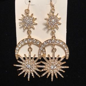Gold dangle starburst earrings